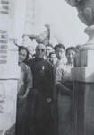 Chinese pilgrims at the top of the tower of the Louvain university library