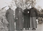 Fr. André Boland, Bp. Paul Yu Pin, Fr. Lucas Tchang, vicar general, and Fr. Raymond de Jaegher.