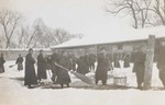 Seminarians shoveling snow