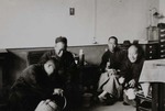 Chinese priests relaxing while drinking tea