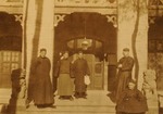 Priests in the courtyard of the episcopal residence