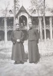 Bp. Cheng Youyou and a priest in the garden of the residence