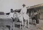 Fr. Vincent Pai on a white horse and Fr. Joseph Ou with his black horse