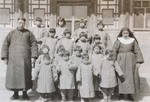 The pastor and Sister with girls of the orphanage
