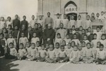 Father Raymond de Jaegher with young school boys