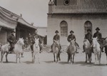 Major seminarians and Raymond de Jaegher riding horses