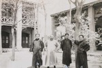 Chinese priests in front of the bishop’s residence
