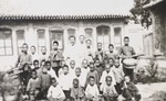 Chinese pastor with school band and children of Lingluo