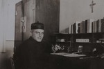 Fr. Paul Gilson at his desk 1