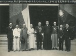 Lo Pahong, Fr. Yu Pin, and staff members