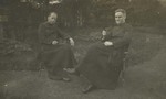 Fr André Boland and Fr. Paul Gilson in the garden