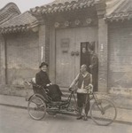 Mgr. Joseph Comisso on a pedicab leaving the Xuanhua procurement house of Beijing