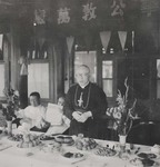 Cardinal Tien with priests and lay Catholic refugees 2