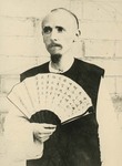 Fr. Vincent Lebbe holding a fan