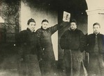 Chinese priests with Fr. Vincent Lebbe holding a copy of the Yishibao 1