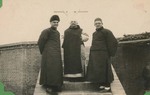 Fr. Vincent Lebbe, Fr. Paul Gilson, and Fr. Raymond de Jaegher in front of the cross of the convent of the Beatitudes