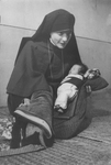 Maryknoll Sister with Orphan Baby