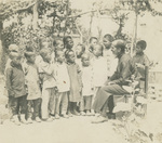 Father Antoine Cotta with Children