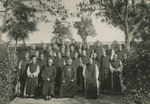 Bishop Jean-Baptiste Wang with the Little Brothers of St. John the Baptist in the Garden of the Monastery of the Beatitude