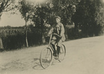 Frédéric (Vincent) Lebbe on a Bicycle